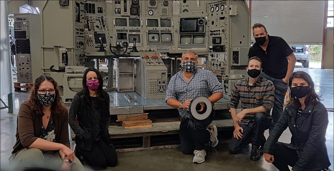 Museum staff, left, with The Arc/k Project team that photographed NR-1’s control room, October 2020.