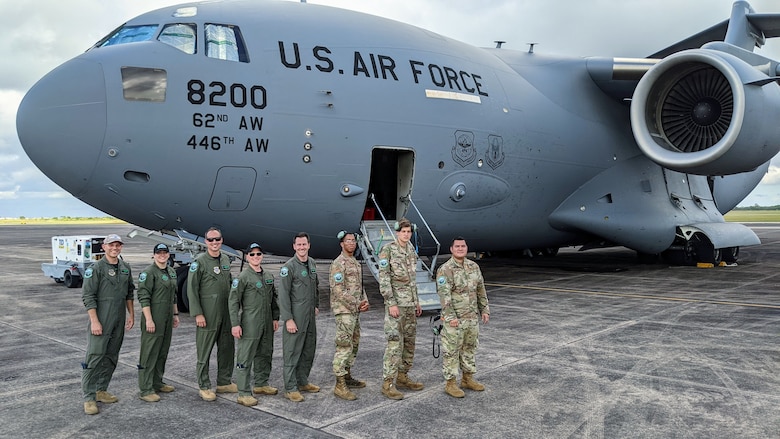 Members of the C-17 West Coast Demo Team stationed at Joint Base Lewis-McChord, Washington, pose for a photo during Wings Over Houston Airshow at Houston, Texas, Oct. 10, 2021. Since the beginning of the season in April 2021, the C-17 Globemaster III Demo team, which consists of seven pilots and five loadmasters, has flown in 14 cities, conducted 26 aerial demonstrations and 42 rehearsal profiles. (Courtesy photo)
