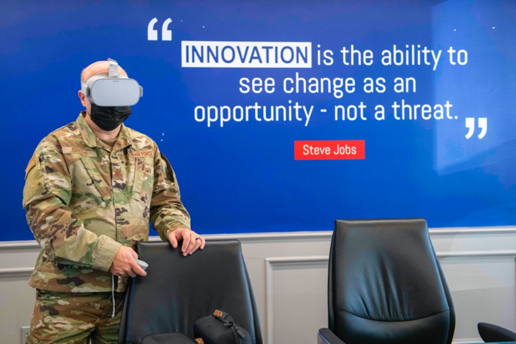 Chaplain (Maj.) Robert Greene, instructor at Air Force Chaplain Corps College at Air University prepares a virtual reality experience at the AR/VR iExpo in Montgomery, Alabama, Nov. 9, 2021. At the expo, local civic leaders and community members experienced how Air University and MGMWERX use cutting-edge technology to enhance training and education by providing a glimpse into realistic situations people may have to face during their careers. (U.S. Air Force photo by Staff Sgt. Lauren Silverthorne)