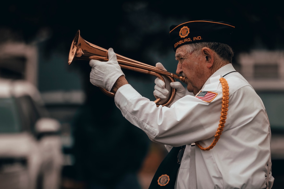 A veterans plays an instrument.