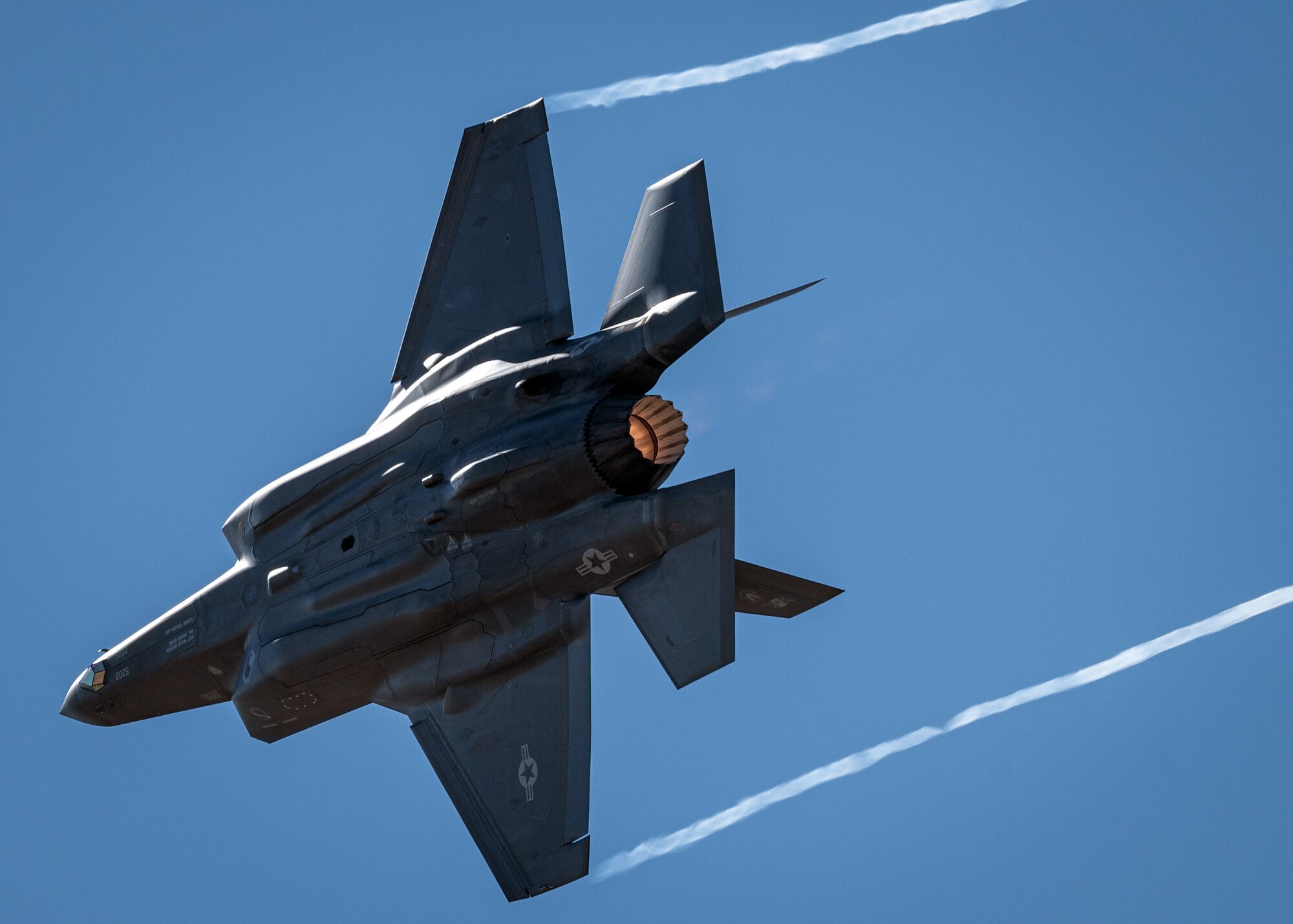 A F-35A banks during a demonstration.