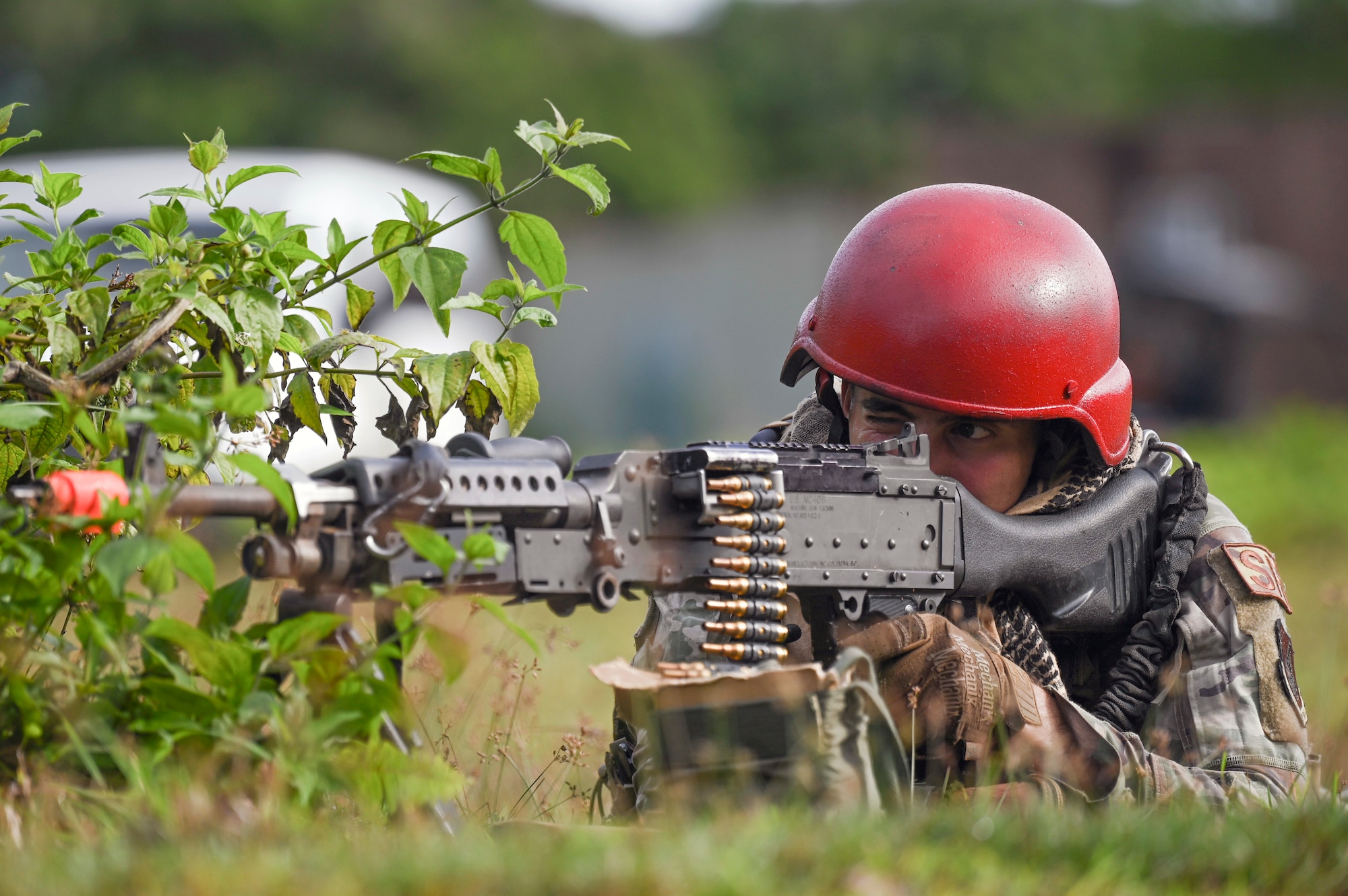 A Airman takes a defensive position.