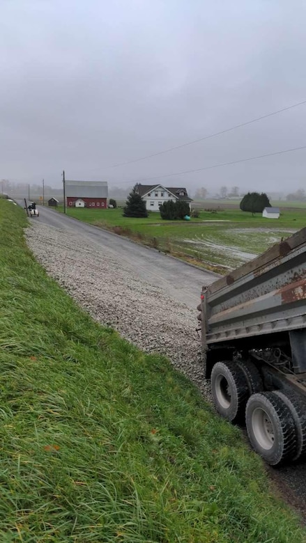 Photo showing signs of seepage on the landward side of a levee.