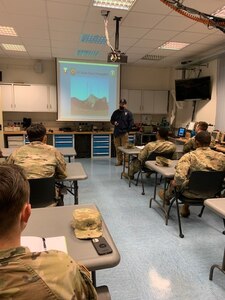 Erik Martin, a Communications-Electronics Command Logistics Assistance Representative assigned to the 405th Army Field Support Brigade’s Army Field Support Battalion Germany, trains Soldiers from 1st Battalion, 4th Infantry Regiment on high frequency systems and antenna theory in Vilseck, Germany. (U.S. Army courtesy photo)