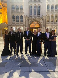 From left, Falicia Ramos, Chief Warrant Officer 2 Irvin Hernandez, Chief Warrant Officer 2 Bradley Hlebain, Chief Warrant Officer 5 Joe Rosamond, Jill Goding, Chief Warrant Officer 5 Kipp Goding, Warrant Officer 1 Ge Xiong and Pangia Xiong in front of Guildhall in London Oct. 21, 2021. The California National Guard members received the Prince Philip Helicopter Rescue Award from the Honourable Company of Air Pilots for their actions rescuing campers and hikers from the Creek Fire in California on Labor Day weekend in 2020.