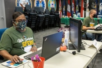 Melanie Jackson and Scott Ferge, U.S. Army Financial Management Command systems accountants, work through the U.S. Army’s year-end close at the Maj. Gen. Emmett J. Bean Federal Center in Indianapolis Oct. 1, 2021. Year-end close encompasses all Army components and echelons from Army commands in coordination with Headquarters Department of the Army, USAFMCOM and the Defense Finance and Accounting Service and other federal entities. (U.S. Army photo by Mark R. W. Orders-Woempner)