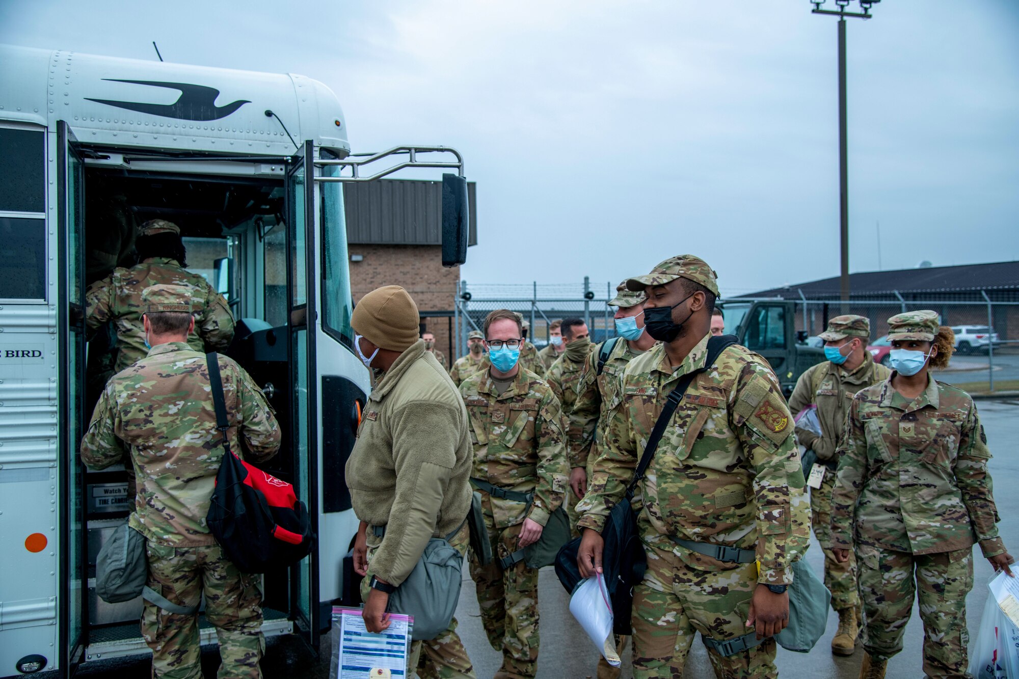 916ARW airmen board a bus during mobilization exercise.