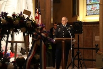 Colonel Joseph Burton, the command chaplain for the 88th Readiness Division, provides the invocation during the wreath laying ceremony honoring former President James A. Garfield, in Cleveland, Ohio, November 13, 2021. Each year, near the anniversary of Garfield's birth, Lake View Cemetery hosts a ceremony honoring the life and legacy of the man who served as president from March to September 1881.
