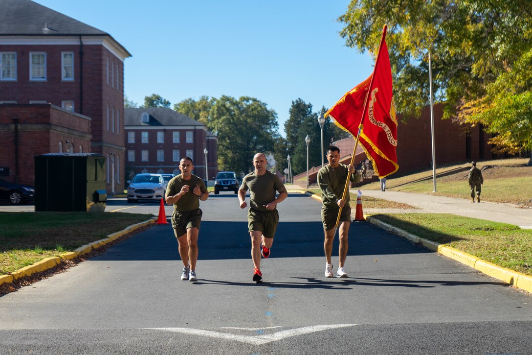 U.S. Marines with Training and Education Command conduct a Marine Corps birthday run on Marine Corps Base Quantico, Virginia, Nov. 9, 2021. Marines took turns running a mile each from 0530 Nov. 9th through 1200 Nov. 10th for a total of 246 miles. (U.S. Marine Corps Photo by Lance Cpl. Mitchell Johnson)