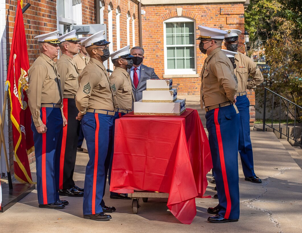 U.S. Marines stand by the Birthday Cake during Training and Education Command's Cake Cutting Ceremony at Yale Hall on Marine Corps Base Quantico, Virginia, Nov. 10, 2021. The attendees celebrated the 246th birthday with the reading of General John A. Lejeune’s birthday message and the traditional cake cutting ceremony. (U.S. Marine Corps photo by Sgt. Quinn Hurt)