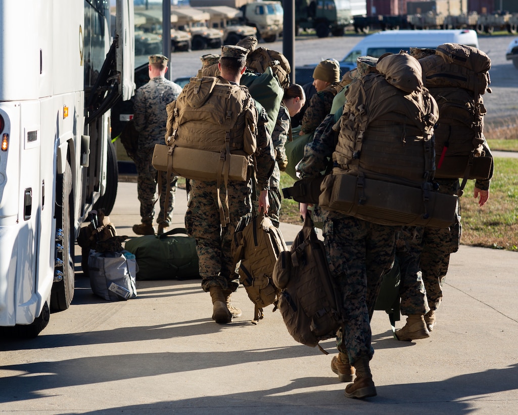 U.S. Marines with 3rd battalion, 6th Marine Regiment (3/6), 2d Marine Division board a bus to depart Fort Pickett on Nov. 15, 2021.