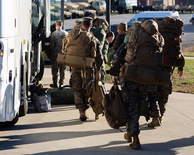 U.S. Marines with 3rd battalion, 6th Marine Regiment (3/6), 2d Marine Division board a bus to depart Fort Pickett on Nov. 15, 2021.