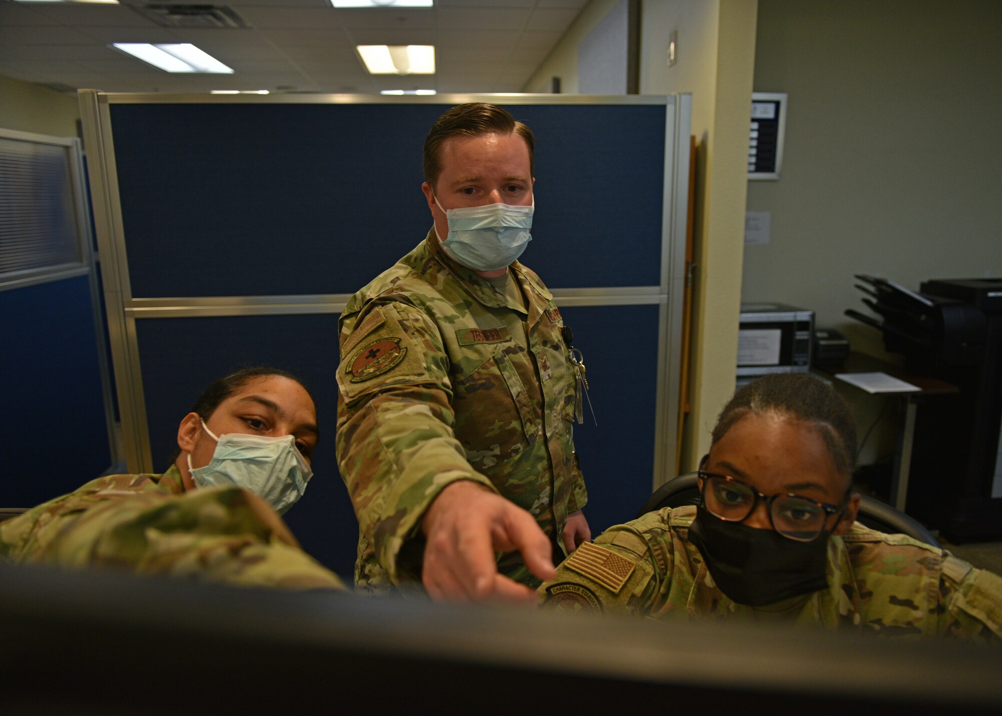 U.S. Air Force Tech. Sgt. Ryan Tegtmeier, 17th Operational Medical Readiness Squadron Military Medicine Clinic flight chief, helps Airmen at the Ross Clinic on Goodfellow Air Force Base, Texas, Nov. 9. Tegtmeier sees almost 250 patients a week consisting of active duty, students, and all other uniformed personnel. (U.S. Air Force photo by Senior Airman Ashley Thrash)