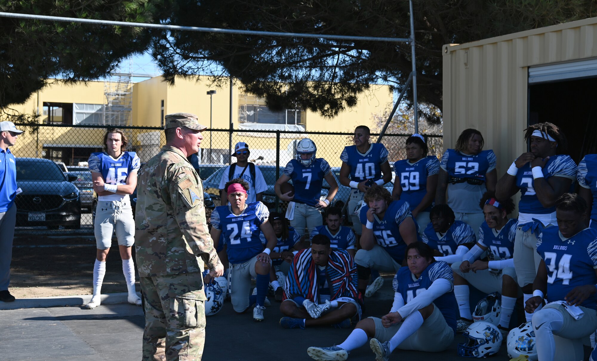 Chief Master Sgt. Jason DeLucy, Space Launch Delta 30 command chief, speaks to the Allan Hancock College football team Nov. 13, 2021, Santa Maria, Calif. DeLucy delivered a pre-game motivational speech to the Allan Hancock College Bulldogs encouraging them to win the game. (U.S. Space Force photo by Airman First Class Tiarra Sibley)