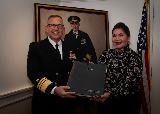 Vice Adm. Jeffrey Trussler presents portrait of Adm. Joseph Clark to the Cherokee Nation.