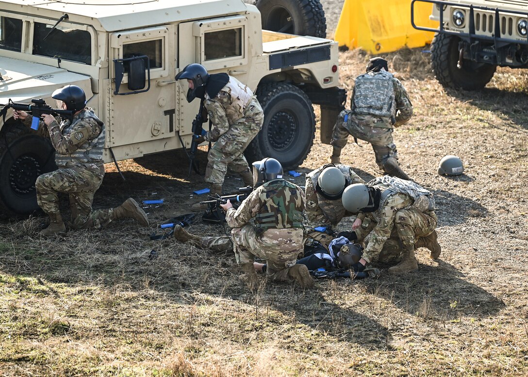 Airmen conduct tactical combat casualty care during an exercise mission