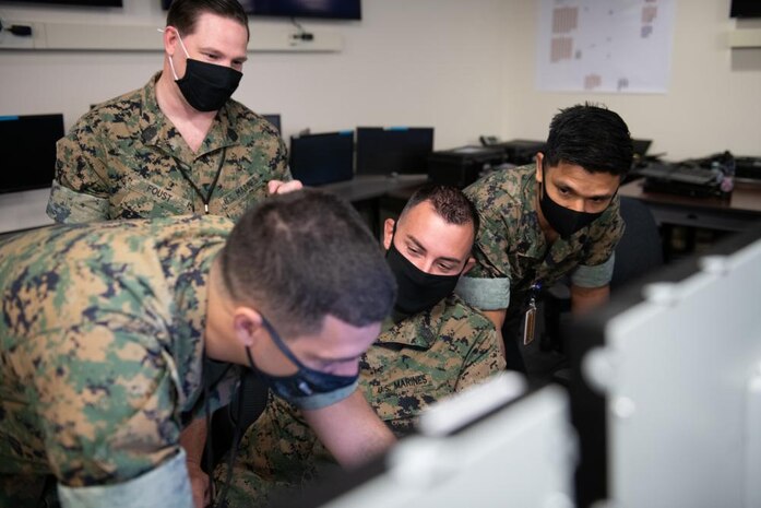 U.S. Marines with Defensive Cyberspace Operations-Internal Defensive Measures, 6th Communication Battalion, compete to capture flags, earning points based off of varying levels of difficulty during the Marine Corps "Capture the Flag" Cyber Games 2021 at Fort Meade, Maryland, Nov. 5. 6th Comm Bn. Cyber Team won the competition with 3,300 points, demonstrating a combination of industry and Marine Corps experience as a recipe for success. The competition consisted of eight teams across the Marine Corps including representatives from each Marine Expeditionary Force, Marine Corps Forces Reserve and the Cyber Mission Force which encompasses Marine Corps Forces Cyberspace Command, and Marine Corps Cyberspace Warfare Group. The Deputy Commandant for Information hosted the third iteration of the Marine Corps Cyber Games which focused on exercising skills related to offensive cyber operations.