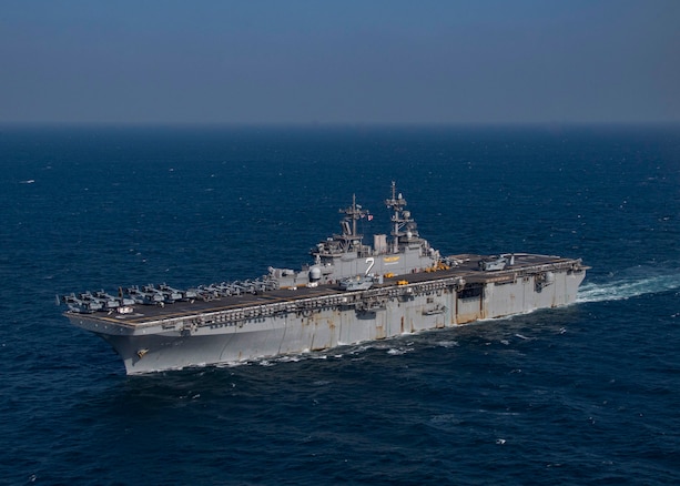ARABIAN GULF (Nov. 13, 2021) Amphibious assault ship USS Essex (LHD 2) transits the Arabian Gulf during flight operations, Nov. 13. Essex and the 11th Marine Expeditionary Unit are deployed to the U.S. 5th Fleet area of operations in support of naval operations to ensure maritime stability and security in the Central Region, connecting the Mediterranean and the Pacific through the western Indian Ocean and three strategic choke points. (U.S. Navy photo by Mass Communication Specialist 1st Class Joseph Rolfe)