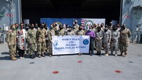 211115-N-LK647-0158 
DJIBOUTI CITY, Djibouti (Nov. 15, 2021) Participants of a Women, Peace, and Security conference held aboard the Expeditionary Sea Base USS Hershel "Woody" Williams (ESB 4) pose for a photo, Nov. 15, 2021. Hershel "Woody" Williams is on a scheduled deployment in the U.S. Sixth Fleet area of operations in support of U.S. national security interests in Europe and Africa. (U.S. Navy photo by Mass Communication Specialist 3rd Class Malachi Lakey/Released)