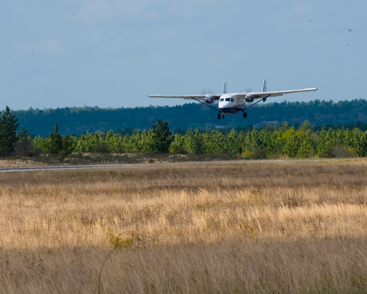 A 6th Special Operations Squadron C-145A aircraft lands on Camp James E. Rudder, April 10, 2013. The aircraft transported service members from various branches of the U.S. military to a safe altitude where they performed the first free fall exercise from a C-145A aircraft. (U.S. Air Force photo/ Staff Sgt. John Bainter)