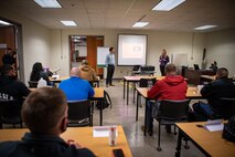 people sitting in a classroom.