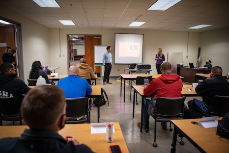 people sitting in a classroom.