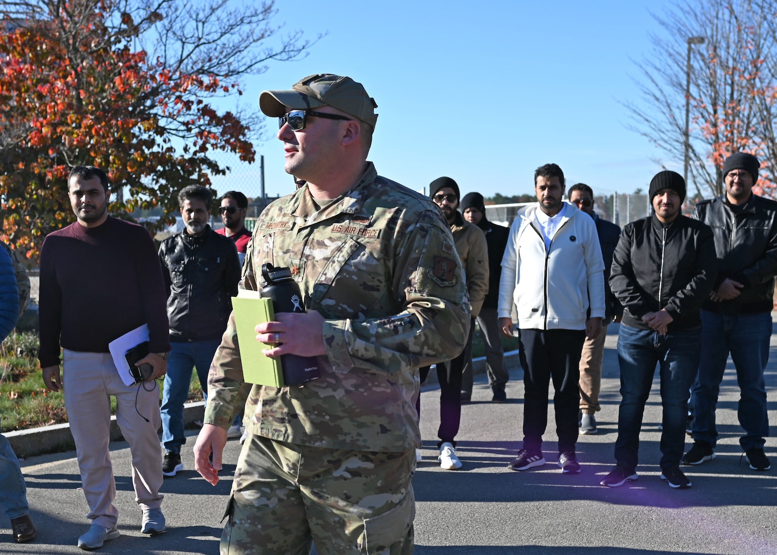 Maj. Aaron McCarthy, NHNG Counterdrug Program coordinator, leads a delegation from the General Directorate of Narcotics Control, Kingdom of Saudi Arabia, on a tour of the Army Aviation Support Facility on Nov. 3 in Concord.
