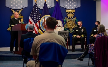 WASHINGTON (Nov. 16, 2021) Chief of Naval Operations (CNO) Adm. Mike Gilday, left, delivers remarks during the Vice Adm. James Bond Stockdale Leadership Award ceremony in the Pentagon. Capt. William H. Wiley, middle, the Special Assistant for Fleet Matters, Naval Reactors Line Locker, and Capt. Bradley D. Geary, commanding officer of Naval Special Warfare Basic Training Command, received the award, which is peer-nominated and presented annually to two commissioned officers who serve as examples of excellence in leadership. (U.S. Navy photo by Mass Communication Specialist 1st Class Sean Castellano/Released)