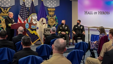 WASHINGTON (Nov. 16, 2021) Chief of Naval Operations (CNO) Adm. Mike Gilday, left, delivers remarks during the Vice Adm. James Bond Stockdale Leadership Award ceremony in the Pentagon. Capt. William H. Wiley, middle, the Special Assistant for Fleet Matters, Naval Reactors Line Locker, and Capt. Bradley D. Geary, commanding officer of Naval Special Warfare Basic Training Command, received the award, which is peer-nominated and presented annually to two commissioned officers who serve as examples of excellence in leadership. (U.S. Navy photo by Mass Communication Specialist 1st Class Sean Castellano/Released)