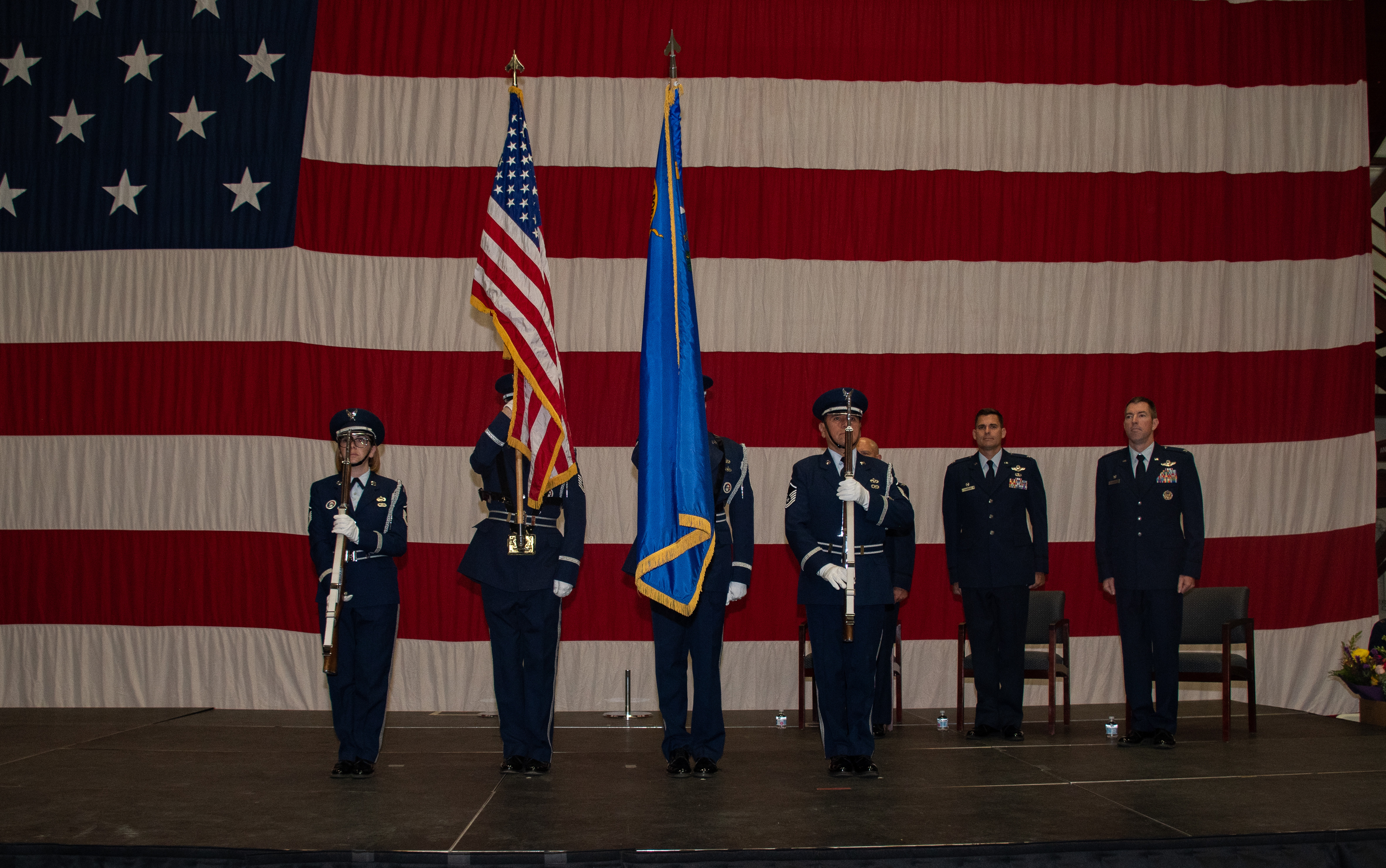 Members of the Nevada Air National Guard Honor Guard present the colors during the National Anthem during a change of command ceremony at the Nevada Air National Guard Base.