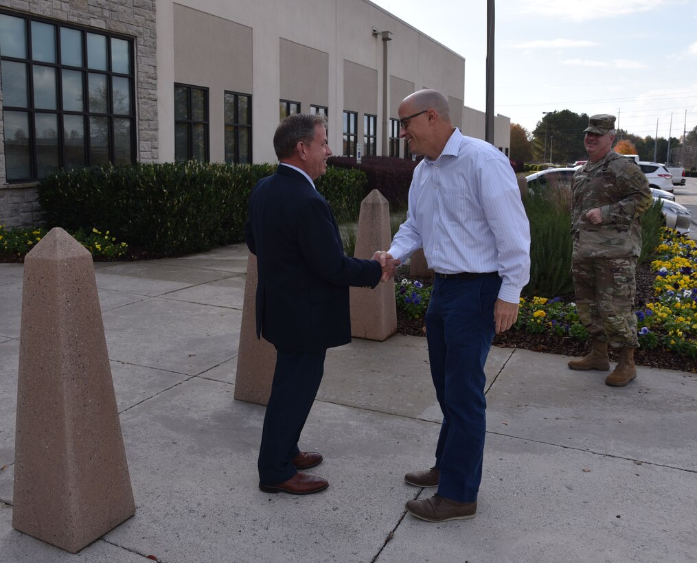 Chip Marin (left), Programs Director, U.S. Army Engineering and Support Center, Huntsville greets Paul Farnan, Principal Deputy Assistant Secretary of the Army (Installations, Energy, and Environment) at the Center Nov. 16. During his visit, Farnan met with Huntsville Center Energy Division representatives and received a capabilities brief highlighting the various programs providing integrated energy savings and security for the Department of Defense, the Army and other federal agencies.