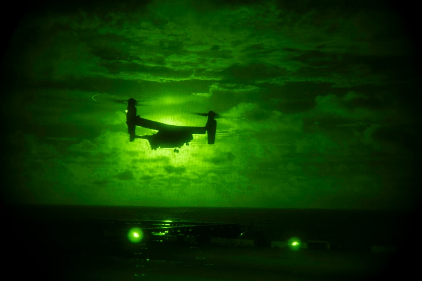 Drone flies at night.