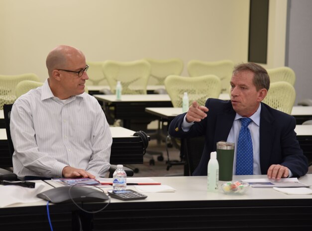 Chip Marin (right), Programs Director, U.S. Army Engineering and Support Center, Huntsville introduces Paul Farnan, Principal Deputy Assistant Secretary of the Army (Installations, Energy, and Environment) to Huntsville Center Energy Division representatives during Farnan’s visit to the Center Nov. 16.Farnan received a capabilities brief highlighting the various programs providing integrated energy savings and security for the Department of Defense, the Army and other federal agencies.