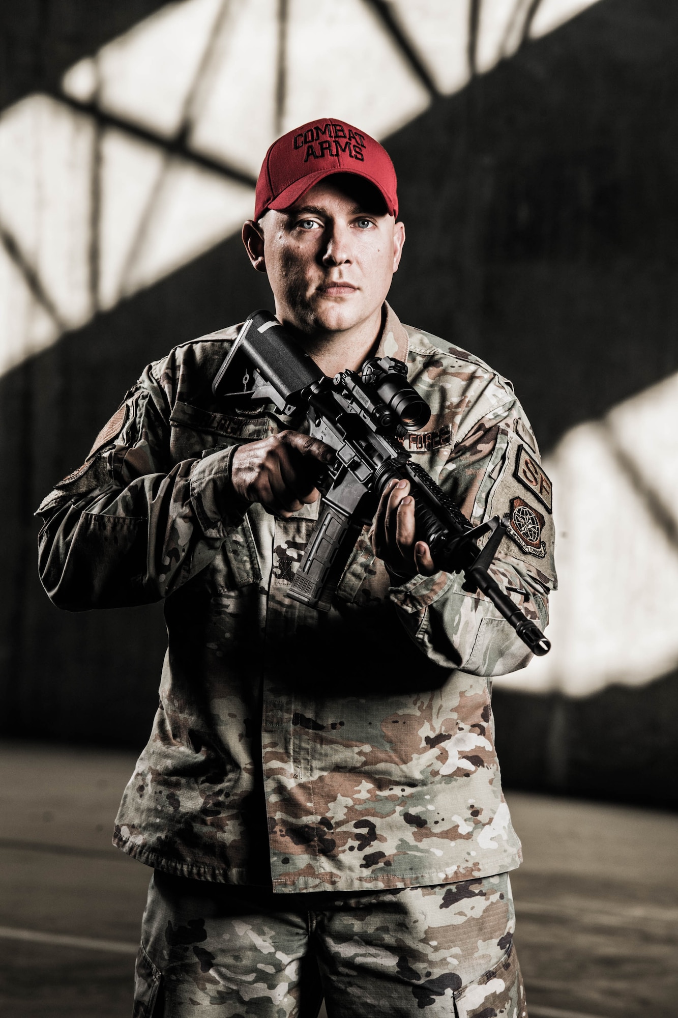 Tech. Sgt. Justin Block, 436th Security Forces Squadron combat arms noncommissioned officer in charge , holds an M4 carbine Nov. 8, 2021, at Dover Air Force Base, Delaware. The M4 is one of 10 weapons systems fired at the Dover AFB Combat Arms Training and Maintenance facility. (U.S. Air Force photo by Mauricio Campino)