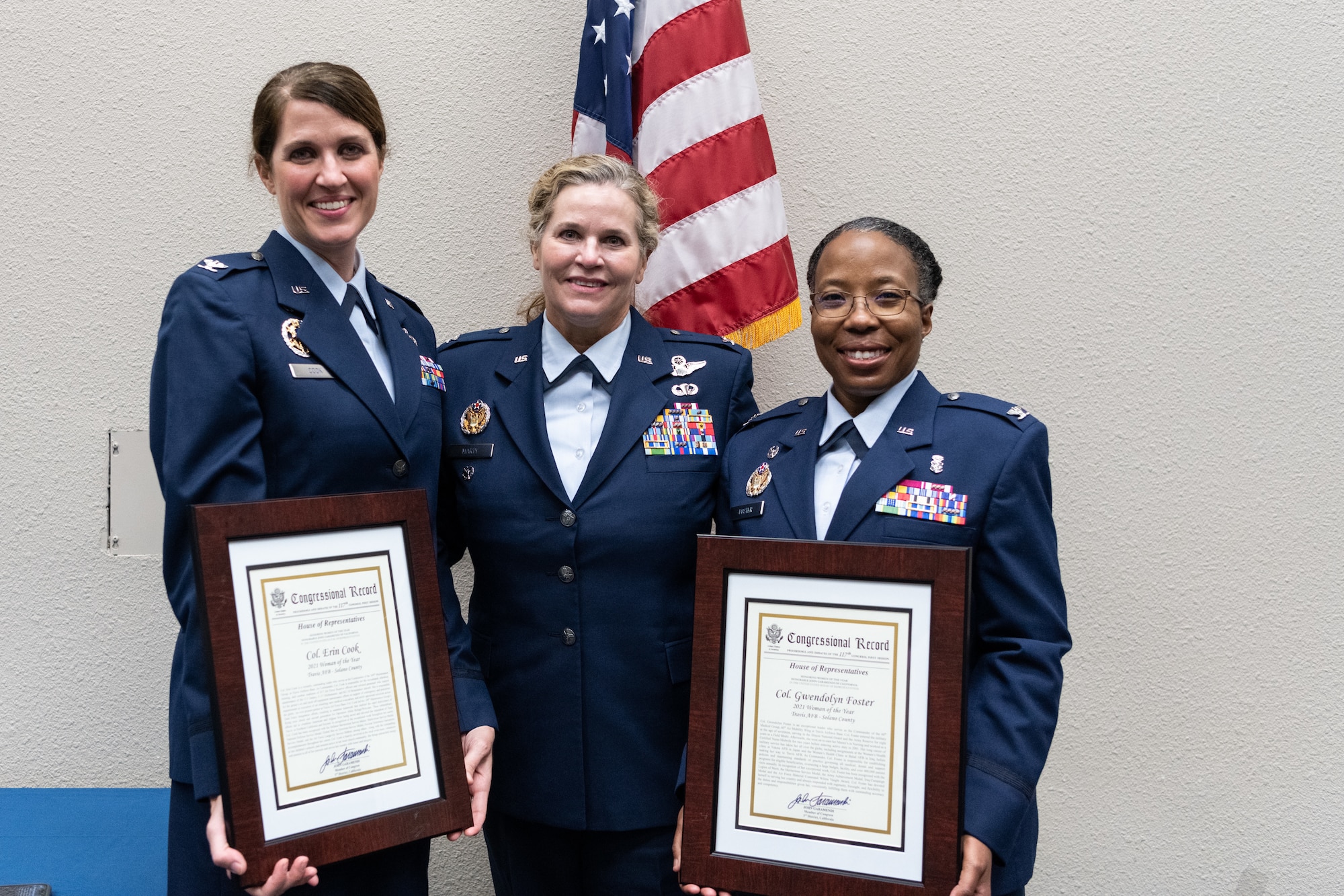 Col. Erin Cook (left), 349th Maintenance Group commander, Col. Jacquelyn Marty (center), 349th Air Mobility Wing vice commander and Col. Gwendolyn Foster(right), 60th Medical Group commander, celebrate receiving California’s 3rd Congressional District’s “Women of the Year” award from Congressman John Garamendi, Nov. 9, 2021, at Woodland Community College. 
Cook and Foster both senior Leaders at Travis Air Force Base, California, were both among the winners of this year’s award.
(Photo by Grant Okubo, 349th Public Affairs)