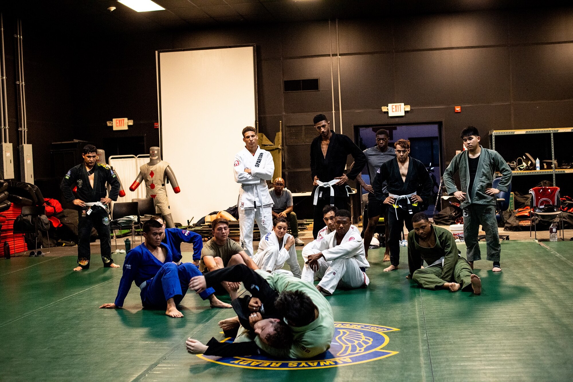 Master Sergeant Christopher Costa, 607th Air Support Operations Group section chief, demonstrates a take-down for a Brazilian Jui Jitsu class at Osan Air Base, Republic of Korea. The class is designed to develop and equip participants of all ranks and backgrounds with the necessary tools to develop physically and mentally.