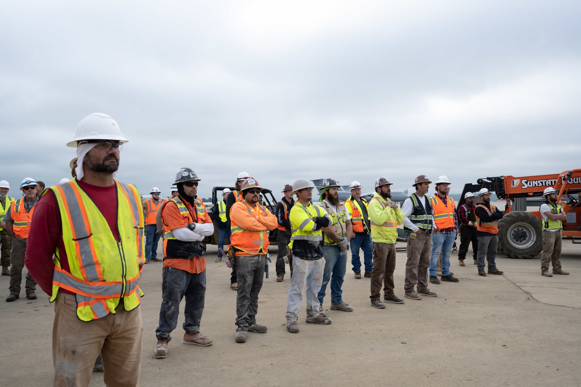 construction workers attend topping out ceremony