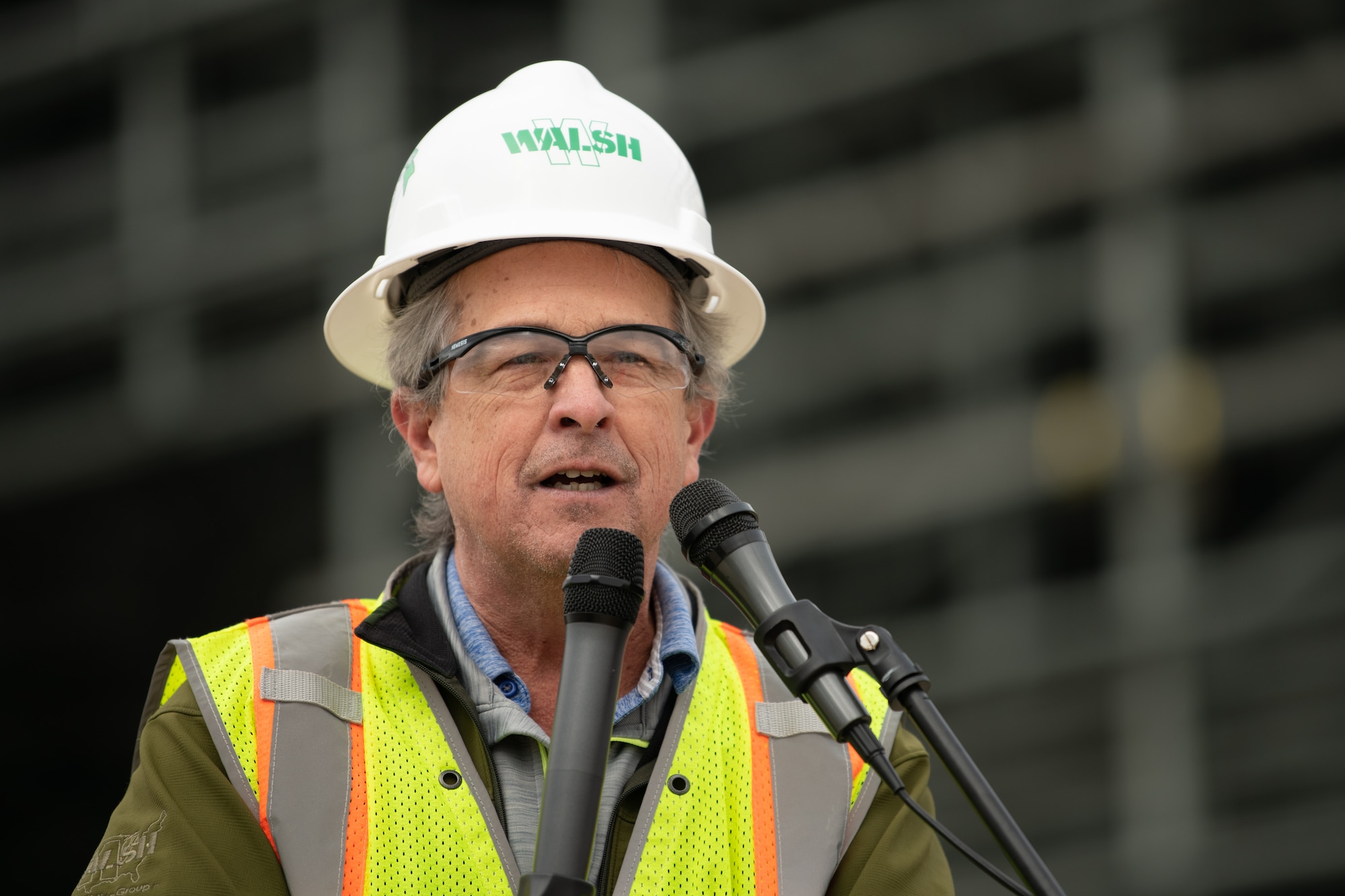 construction workers attend topping out ceremony