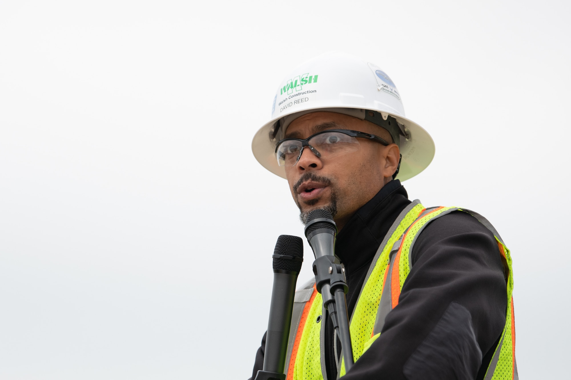 construction workers attend topping out ceremony