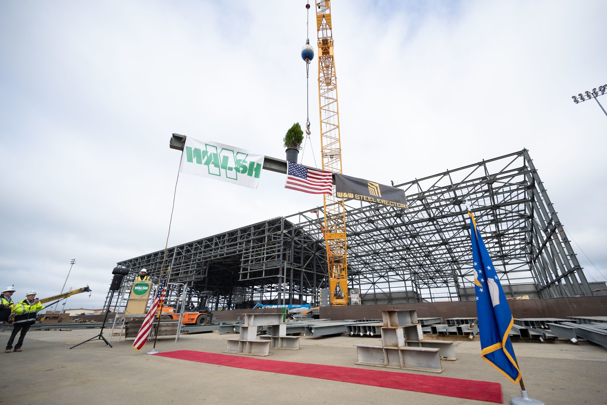 construction workers attend topping out ceremony