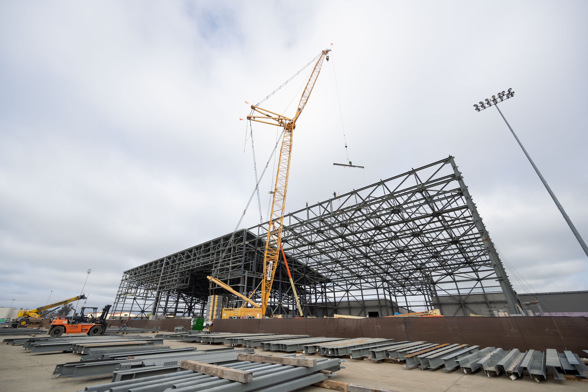 construction workers attend topping out ceremony