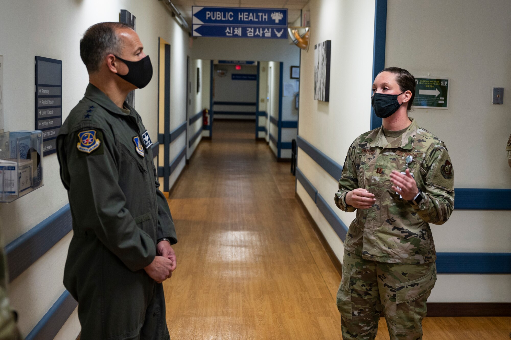 Capt. Ellie Prinster, 8th Operational Medical Readiness Squadron physical therapist, talks about new mobile physical therapy capabilities with Lt. Gen. Scott Pleus, Seventh Air Force commander, and Chief Master Sgt. Alvin Dyer, Seventh Air Force command chief, at Kunsan Air Base, Republic of Korea, Nov. 10, 2021.