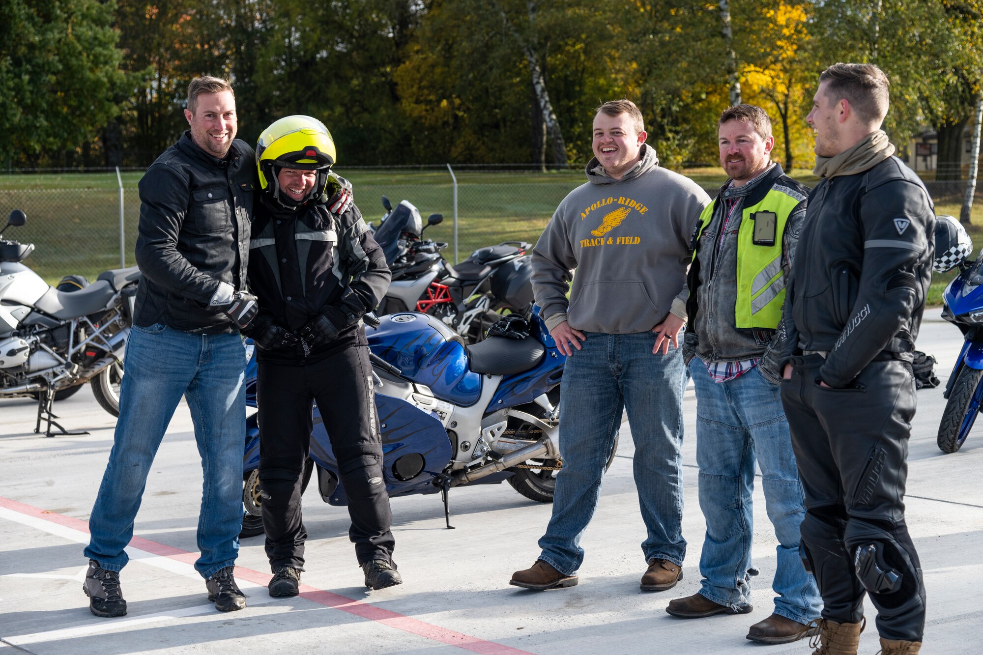 Instructors and prospective Rider Coaches for the Motorcycle Safety Foundation Rider Coach Trainer Course take a break from training on Spangdahlem Air Base, Germany, Oct. 22, 2021. U.S. Air Force members from both Spangdahlem AB and Ramstein AB came together for the course due to Spangdahlem’s unique training opportunities on the full-size, secure motorcycle training range. (U.S. Air Force photo by Senior Airman Ali Stewart)