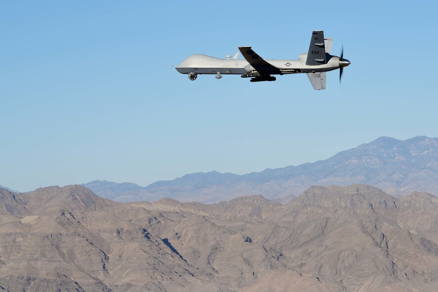 Creech and Nellis Airmen coordinated a training flight together on the Nevada Test and Training Range, July 15, 2019. Aircrew with the 66th Rescue Squadron trained on the range and integrated with the MQ-9 Reaper aircrew to document the Reaper in flight. (U.S. Air Force photo by Senior Airman Haley Stevens)