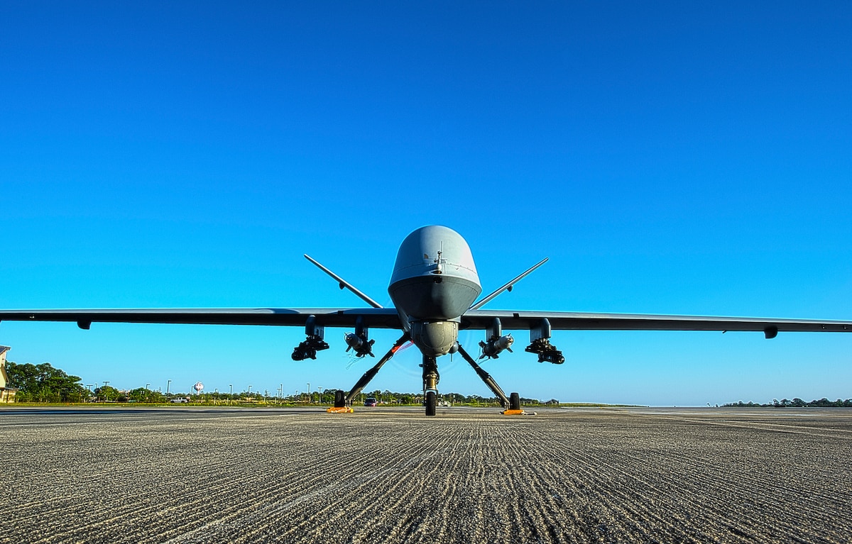 An MQ-9 Reaper sits on the flight line at Hurlburt Field, Fla., May 3, 2014.The MQ-9 Reaper is an armed, multi-mission, medium-altitude, long-endurance remotely piloted aircraft that is employed primarily as an intelligence-collection asset and secondarily against dynamic execution targets. (U.S. Air Force photo illustration/Staff Sgt. John Bainter)