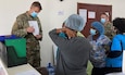 U.S. Soldier Capt. Matthew Gomberg, assigned to the Michigan National Guard, provides emergency medicine mentorship to members of the Armed Forces of Liberia (AFL) at 14 Military Hospital in Latvia.