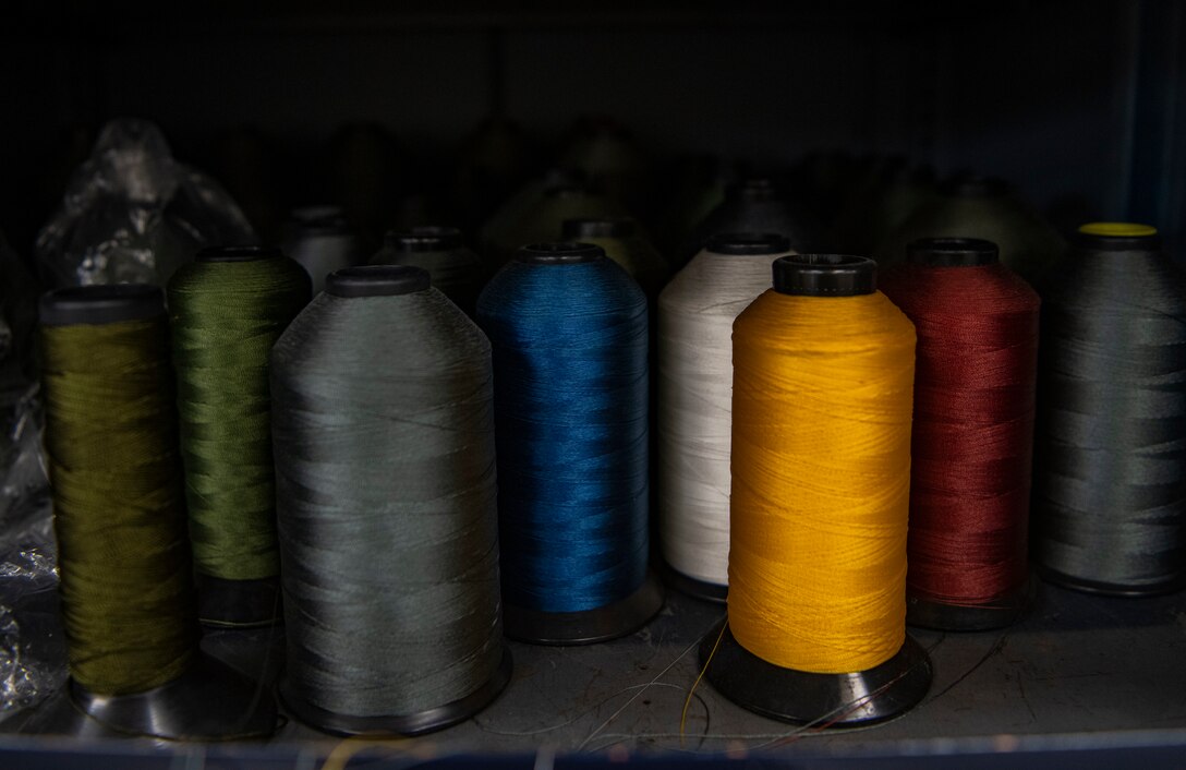 The 8th Operation Support Squadron aircrew flight equipment technicians are skilled sewers, sewing and repairing emergency flight equipment daily at Kunsan Air Base, Republic of Korea, Nov. 8, 2021. From packing emergency items like parachutes and survival kits to maintaining regularly used items like oxygen masks, the attention to detail by these Airmen could mean the difference between life and death. (U.S. Air Force photo Staff Sgt. Jesenia Landaverde)