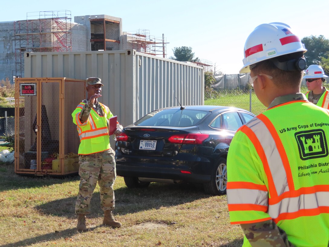 USACE Command Sergeant Major (CSM) Patrickson Toussaint discusses organizational priorities and safety with USACE Philadelphia District team members during a November 2021 visit to Dover Air Force Base.