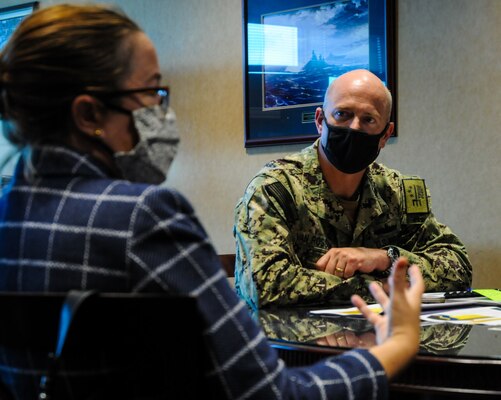 Randi R. Cosentino, Ed.D., left, president of the United States Naval Community College, discusses the educational opportunities provided by the USNCC with senior leadership of U.S. Third Fleet. The USNCC is the community college of the Navy, Marine Corps, and Coast Guard and provides an opportunity for active duty enlisted Sailors, Marines and Coast Guardsmen to earn a naval-relevant associate degree through asynchronous online courses taught by military-friendly and experienced educators. (U.S. Navy photo by Chief Mass Communication Specialist Xander Gamble)