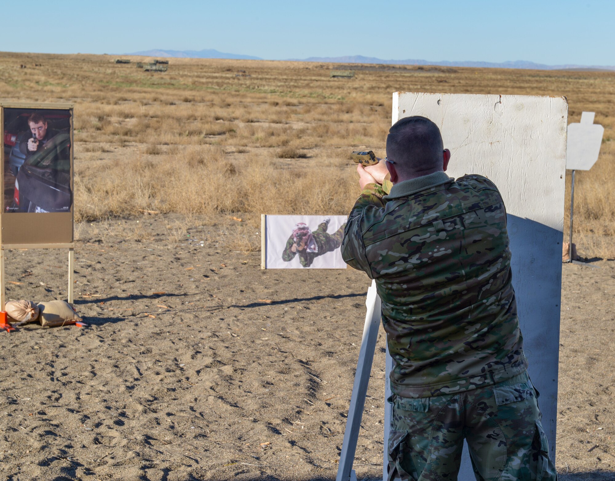 U.S. Air Force Command Chief Master Sgt. David Wade, Air Combat Command, shoots an M18 pistol on Mountain Home Air Force Base, Idaho, Nov. 8, 2021. The acquisition of the M18 pistol is part of an Air Force wide effort to modernize the force.
